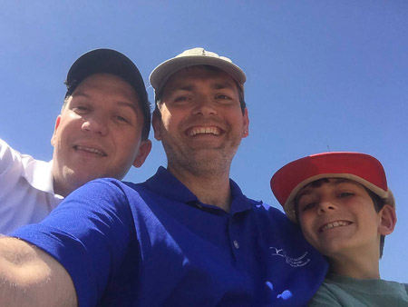 Joe, Andrew, and Jonah golfing