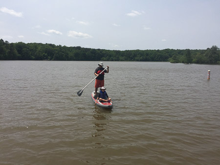 Andrew and Jonah on the paddleboard 