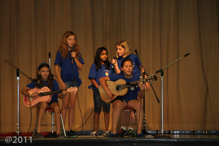 Ella singing and playing guitar at 5th grade talent show: 