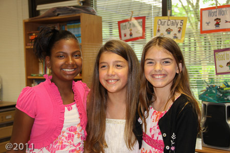 Winter, Melissa, and Ella in their classroom