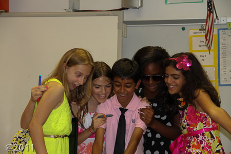 Kaveen and the ladies checking out some technology