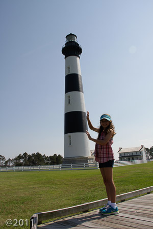 Ella holding up the light