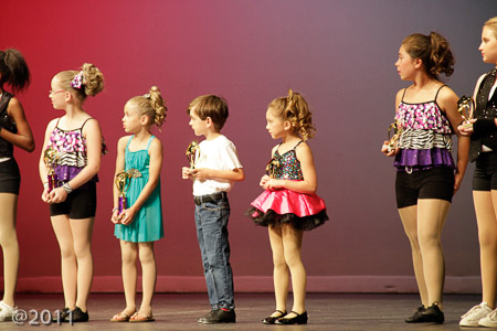 Jonah receiving his 3rd Year Trophy at APA Recital