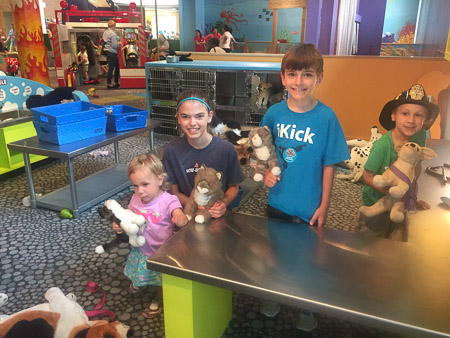 Marin, Ella, Jonah, and Adrian at Marbles