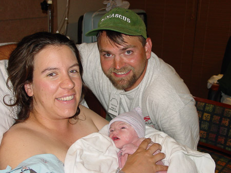First family photo of Sarah, Andrew and Ella