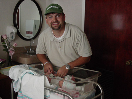I can't get rid of this smile...Even while I am changing a diaper!
