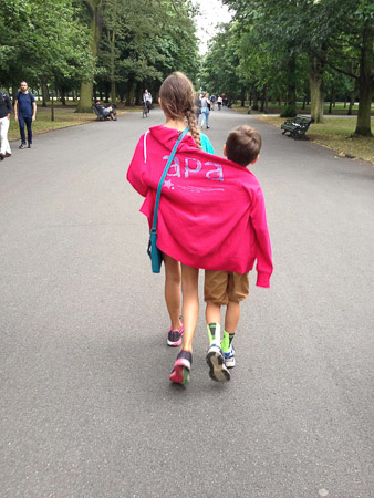 Siblings sharing a sweatshirt in Regent's Park