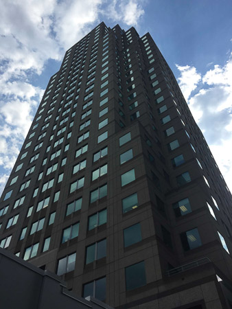 Look carefully for Andrew on his ninth floor balcony!