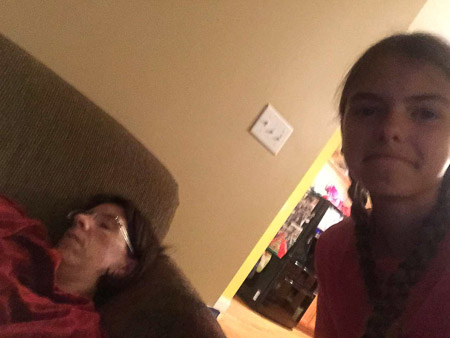 Ella took this selfie with a sleeping Sarah