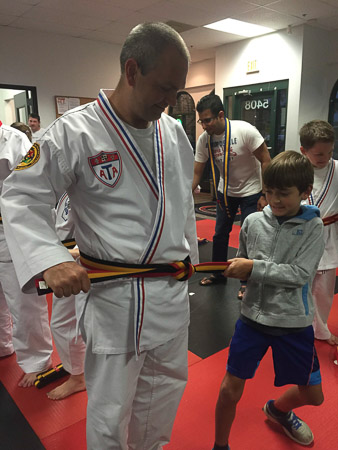 Andrew's graduation--now he and Jonah are the same belt 