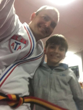 Andrew's graduation--now he and Jonah are the same belt 
