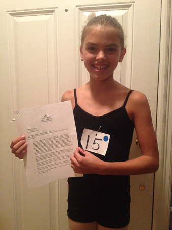 Happy dancer with her Clara contract
