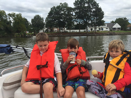 Britt, Jonah, and Eddie on the boat