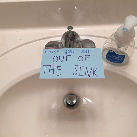 Siblings sharing a bathroom
