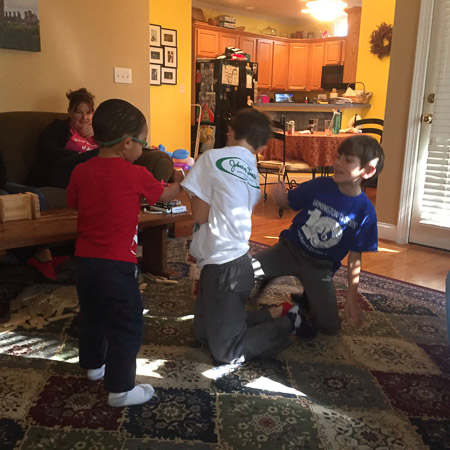 Gabe, Noah, and Jonah wrestling