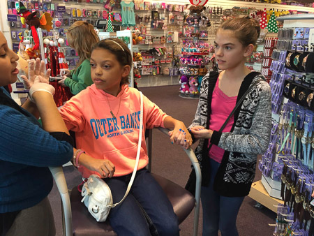 Emily getting her third set of piercings