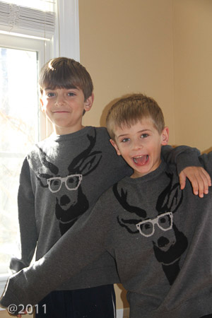 Cousins in matching sweaters