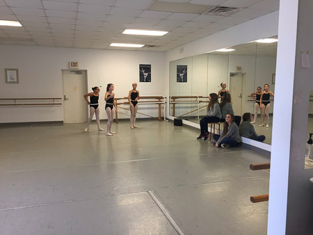 Grace and Gloria watching Ella's rehearsal